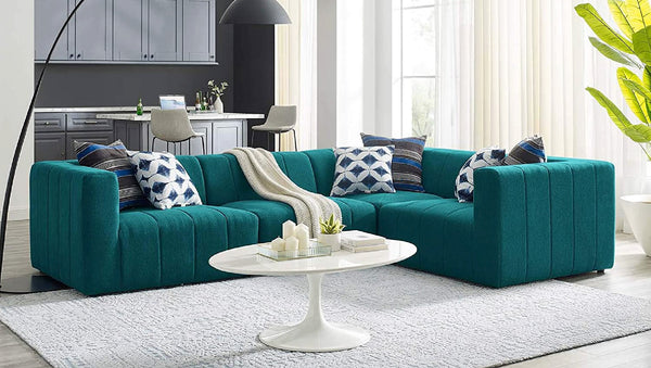 How to Choose Between Leather and Fabric Lounges for Your Space