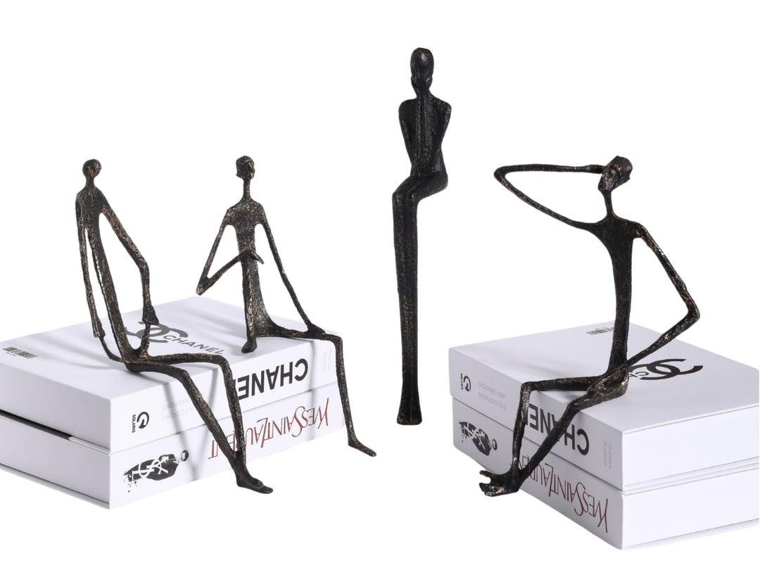 Minimalist Nordic Sitting Figurine – Black & Gold Metal