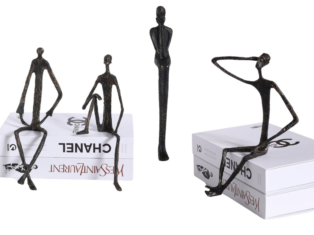 Minimalist Nordic Sitting Figurine – Black & Gold Metal