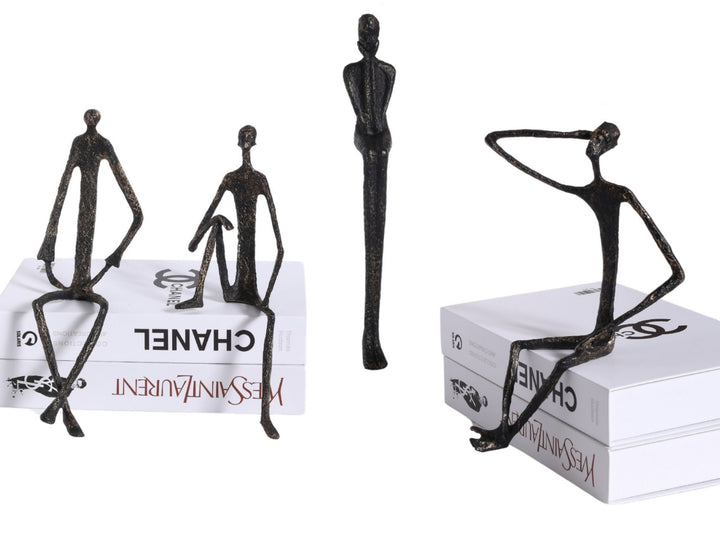 Minimalist Nordic Sitting Figurine – Black & Gold Metal