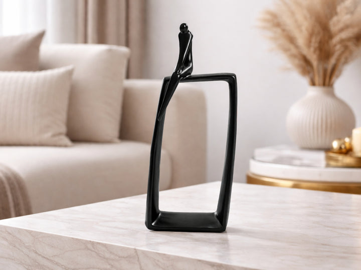 Black Ceramic Sitting Alone Statue