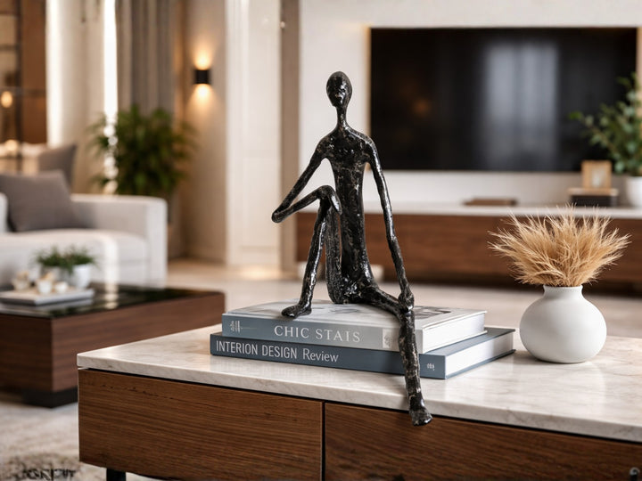 Minimalist Nordic Sitting Figurine – Black & Gold Metal