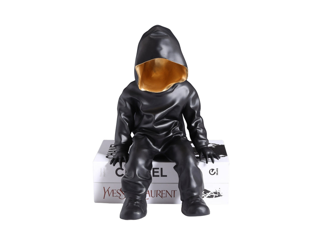 Black Hooded Gold-Faced Figurine
