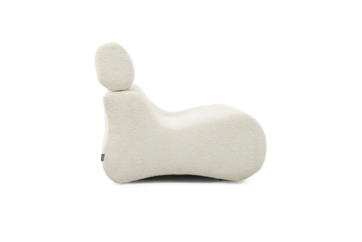 White knitted animal-shaped pillow on a white background