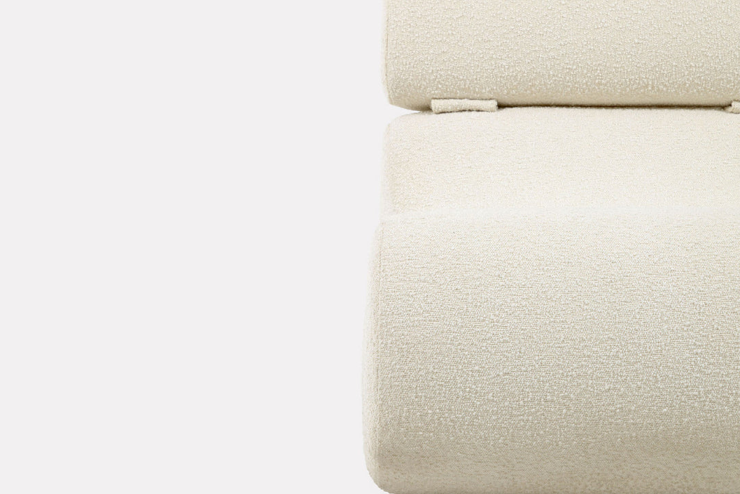 Close-up of a textured beige fabric surface