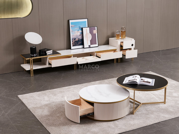 Modern living room with a TV stand, coffee table, and decor