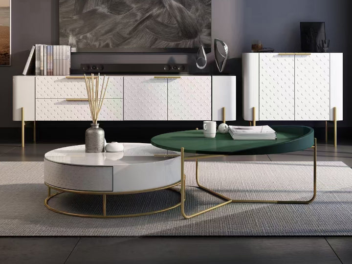 Modern living room with a green coffee table and white cabinet.