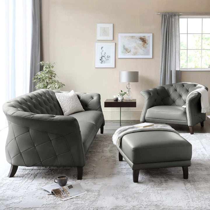 Gray sofa set with ottoman in a living room setting