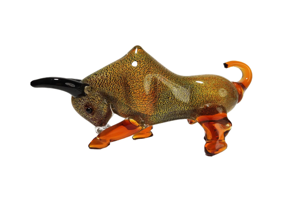 Glass figurine of a stylized animal with brown and orange colors on a white background
