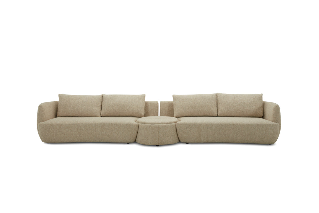 Green sectional sofa on a white background