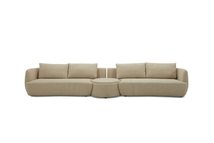 Green sectional sofa on a white background