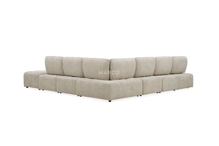 Beige sectional sofa on a white background with 'Mango' branding.