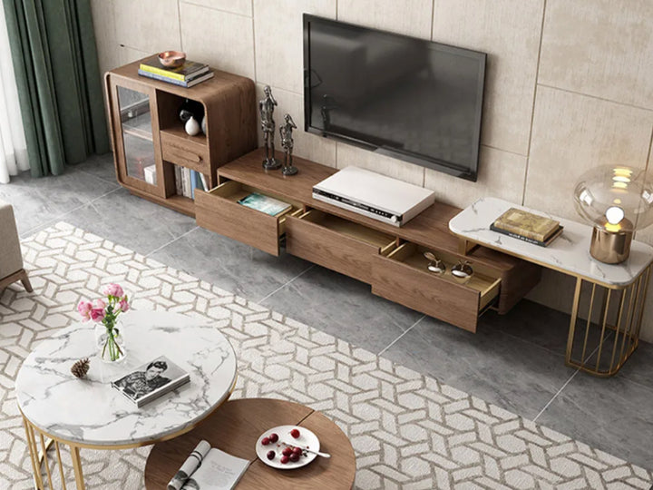 Modern living room with wooden TV stand and marble accents.