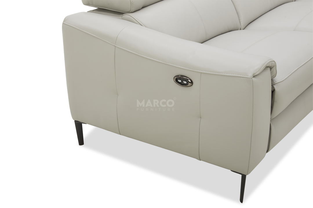 Gray sofa with 'Marco' branding on a white background