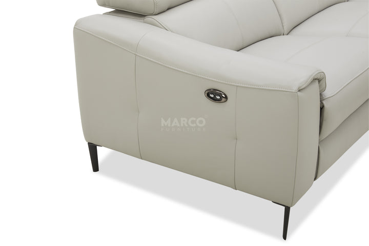Gray sofa with 'Marco' branding on a white background