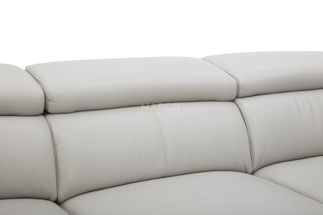 Close-up of a light gray leather sofa