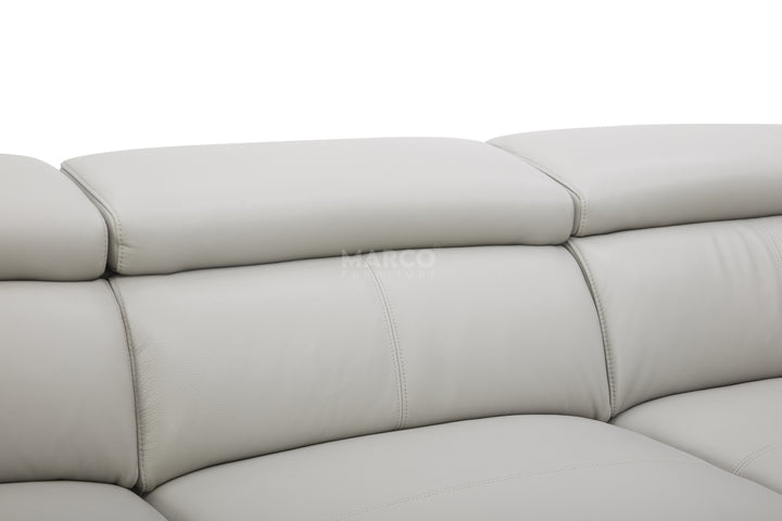 Close-up of a light gray leather sofa