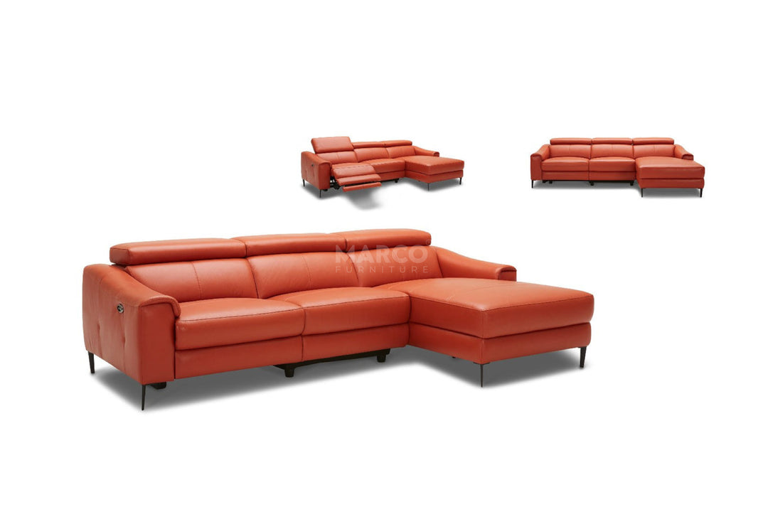 Red leather sectional sofa with additional chairs on a white background