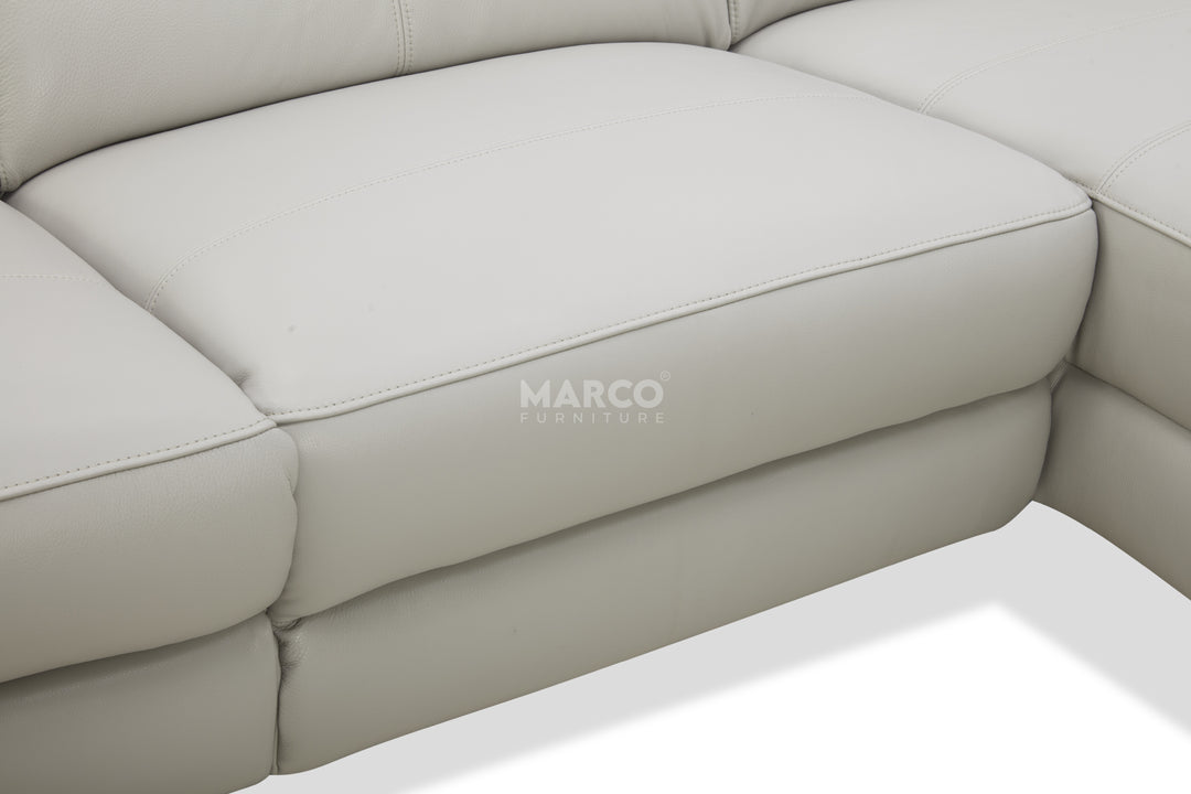 Beige corner sofa with 'MARCO' branding on a white background