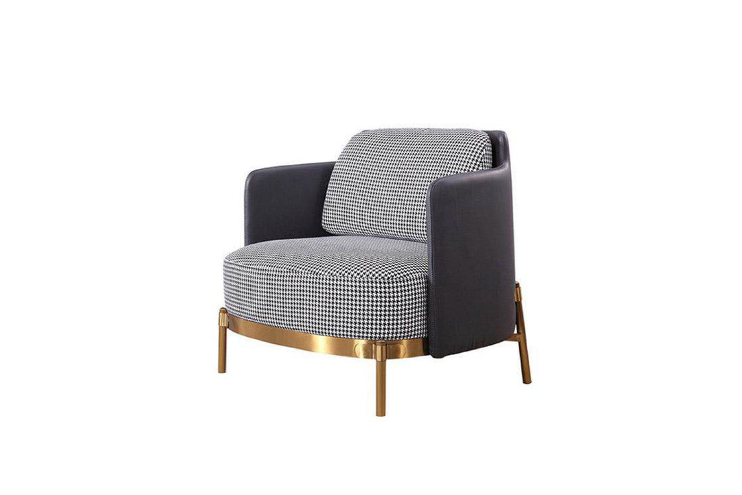 Modern armchair with checkered pattern and gold accents on a white background