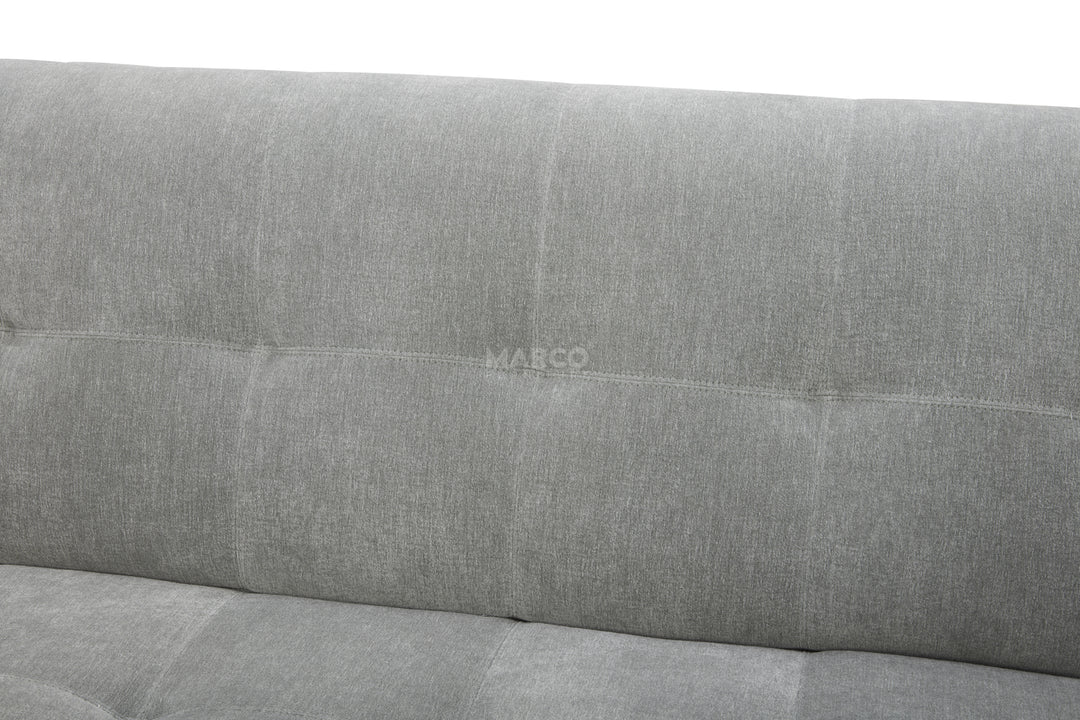 Gray upholstered headboard with 'MARCO' branding on a white background