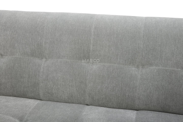 Gray upholstered headboard with 'MARCO' branding on a white background