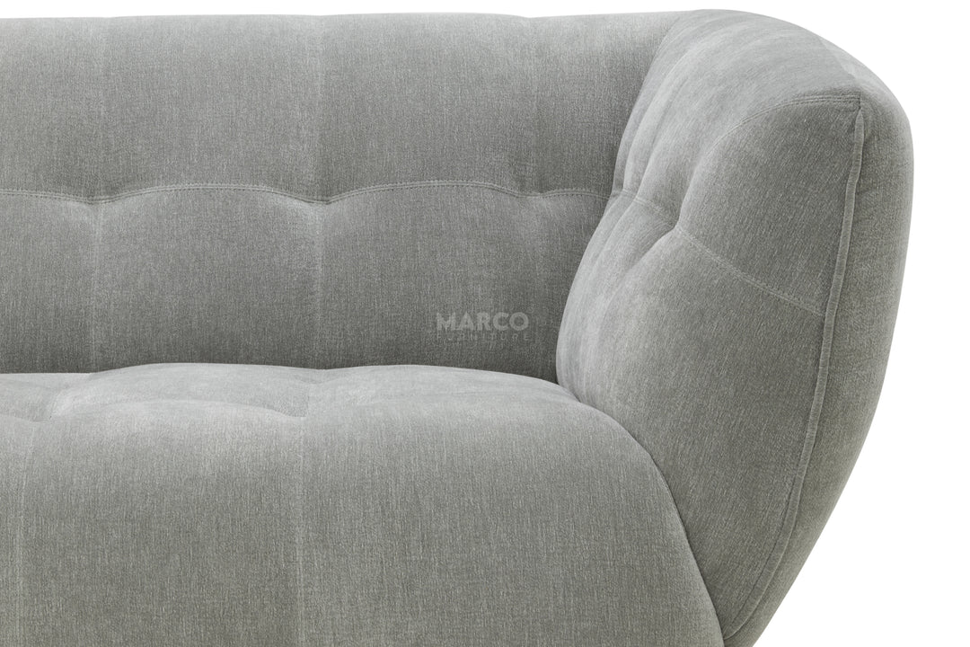 Gray sofa with 'MARCO' branding on a white background
