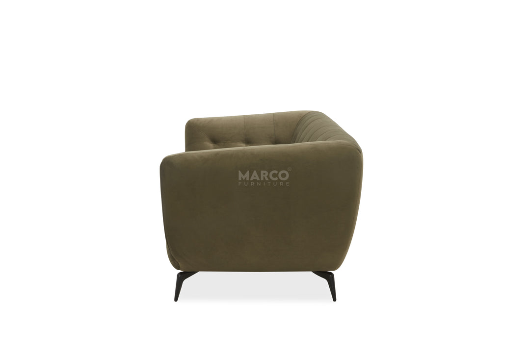 Green armchair with 'Marco' branding on a white background