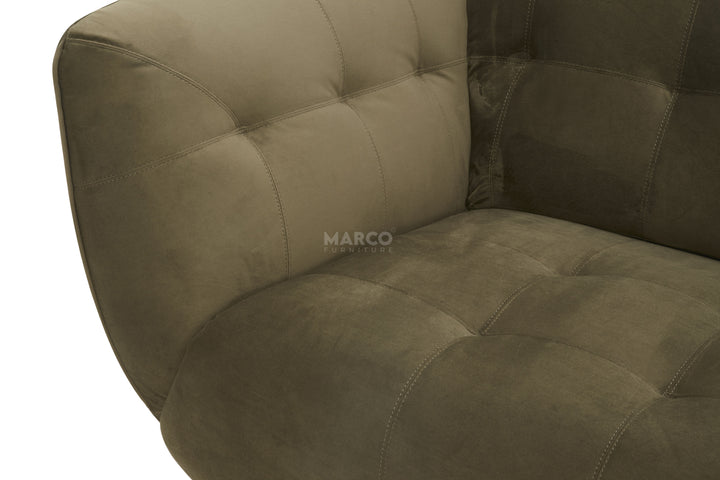 Brown upholstered chair with tufted design on a white background