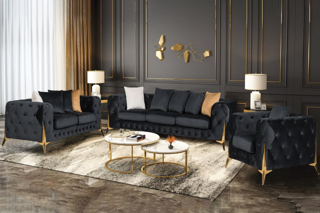 Modern living room with black velvet sofa set and gold accents