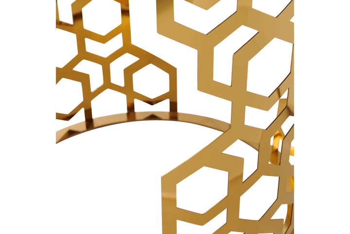 Gold geometric bracelet on a white background