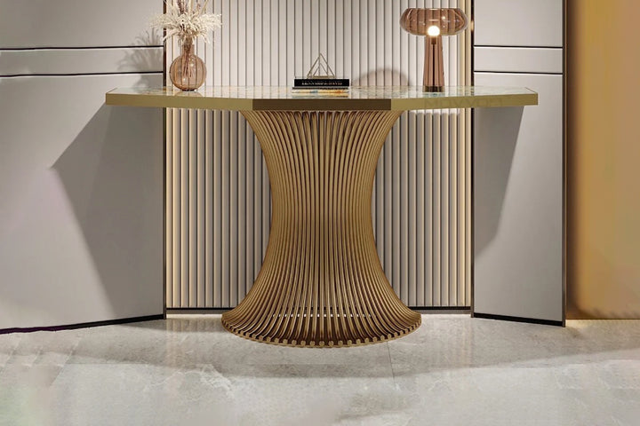 Modern console table with decorative items against a neutral wall.