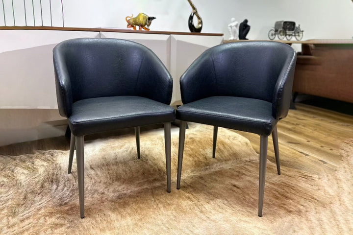 Leo Faux Leather Dining Chair with Curved Backrest & Steel Legs