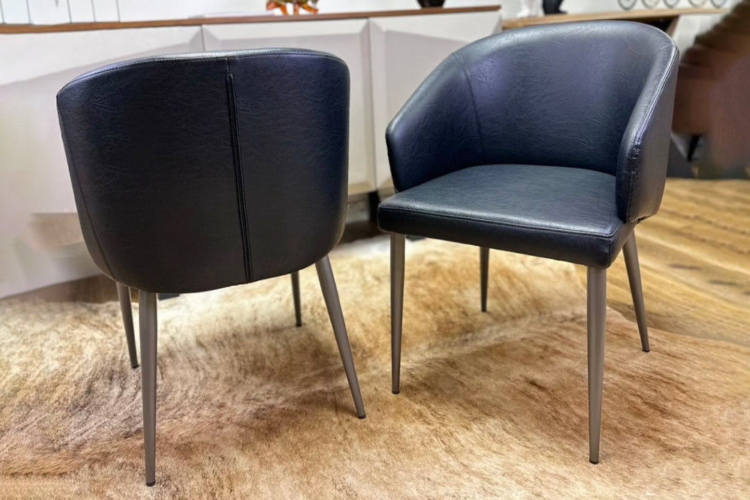 Leo Faux Leather Dining Chair with Curved Backrest & Steel Legs