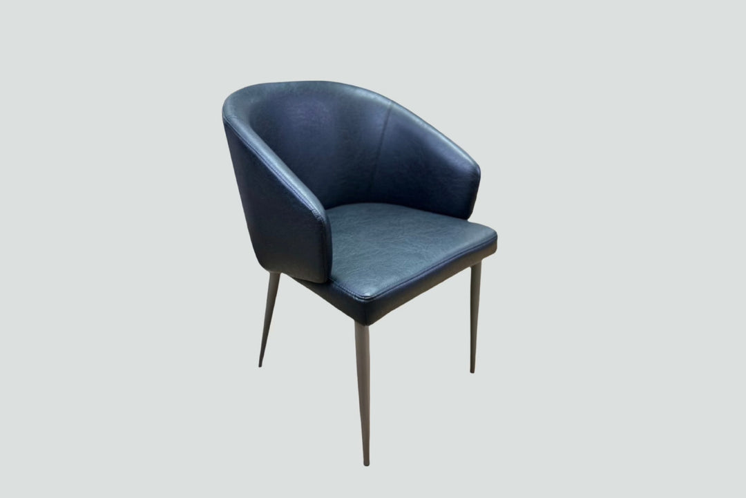 Leo Faux Leather Dining Chair with Curved Backrest & Steel Legs
