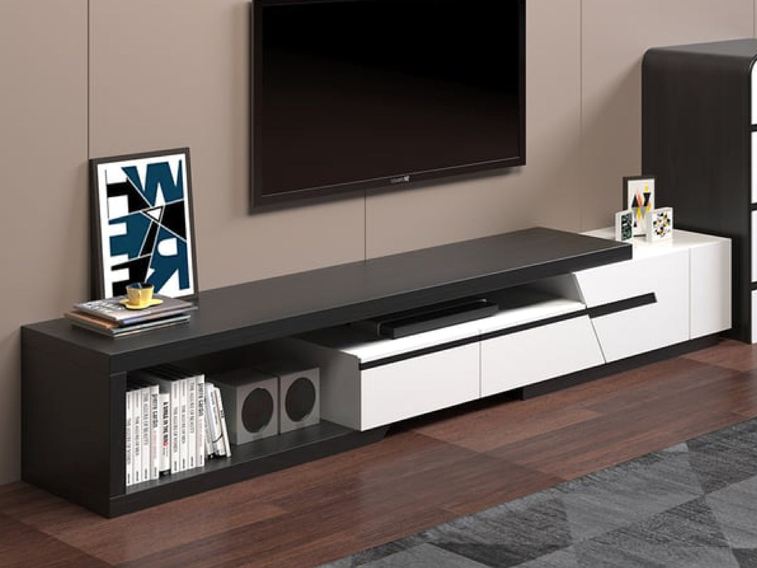 Modern TV stand with black and white design in a living room.