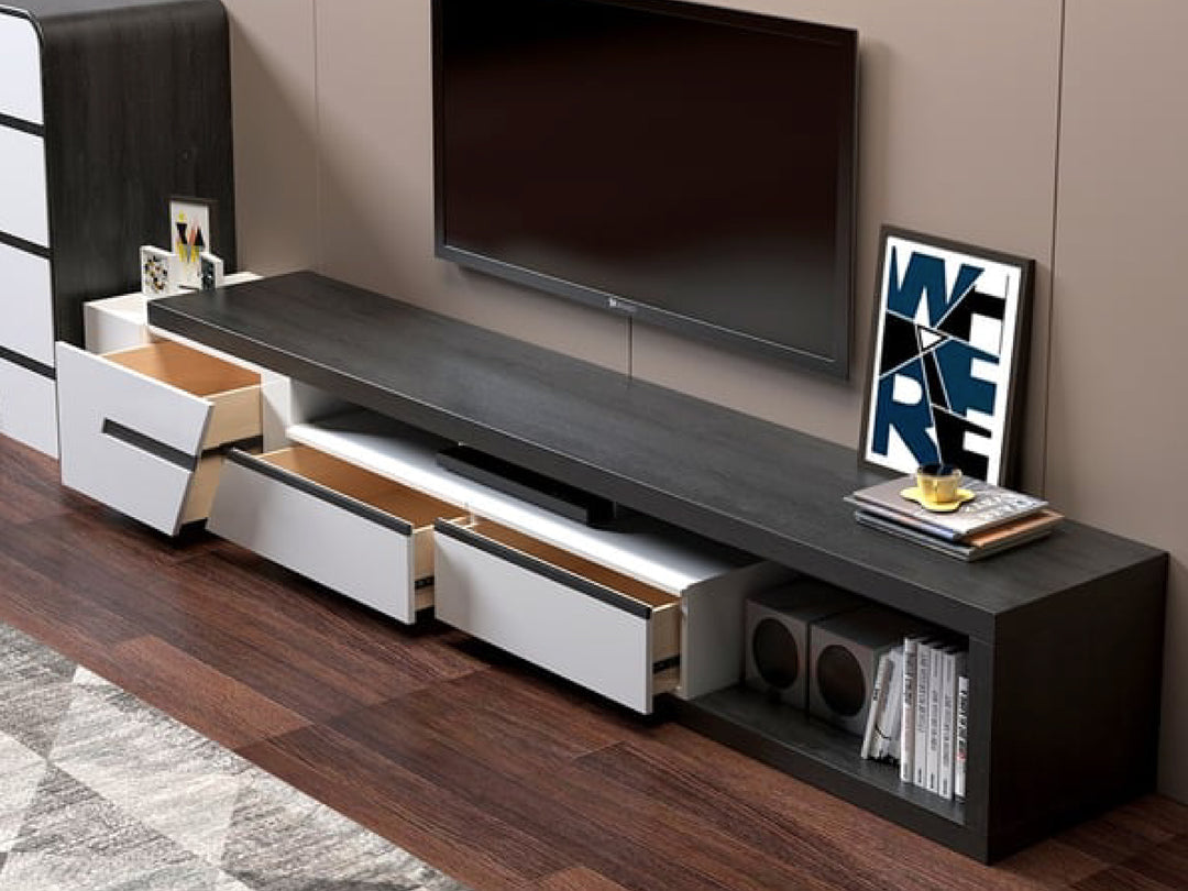 Modern TV stand with storage drawers and a television.