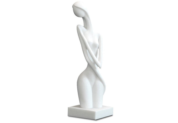 A white sandstone sculpture of an abstract female form with flowing curves, intended as a table centerpiece.