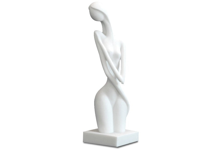 A white sandstone sculpture of an abstract female form with flowing curves, intended as a table centerpiece.