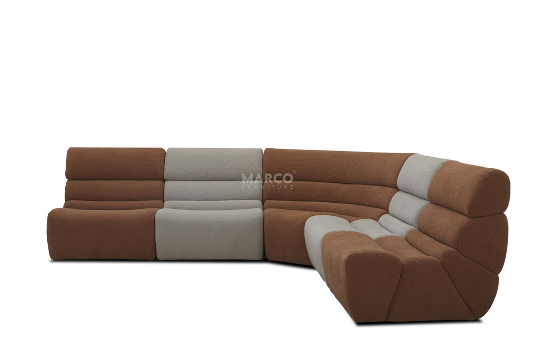 Brown and beige sectional sofa on a white background
