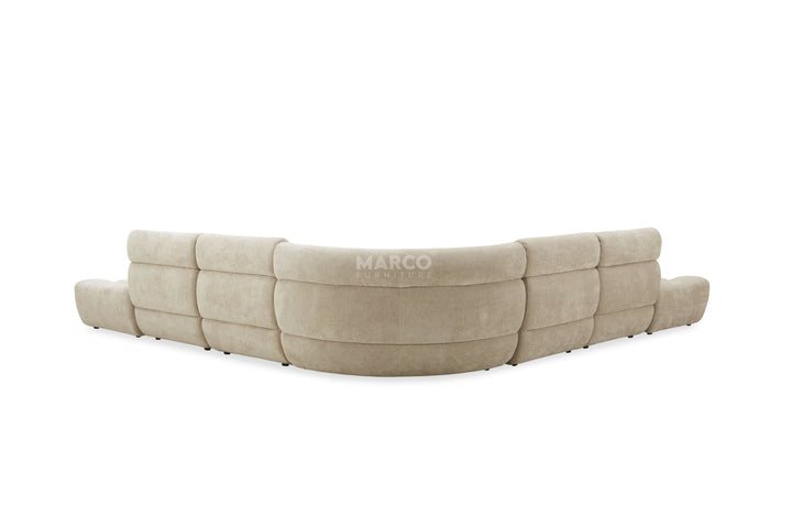 Beige sectional sofa with 'MARCO' branding on a white background