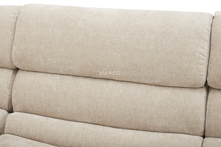 Beige sofa with 'MARCO' branding on a white background