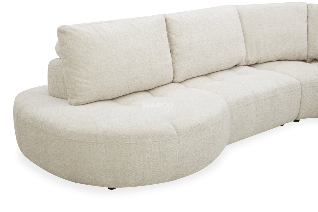 Beige sectional sofa on a white background
