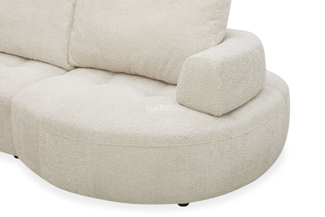 Beige fabric sofa on a white background