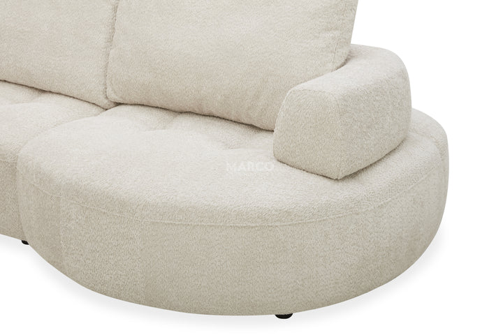 Beige fabric sofa on a white background
