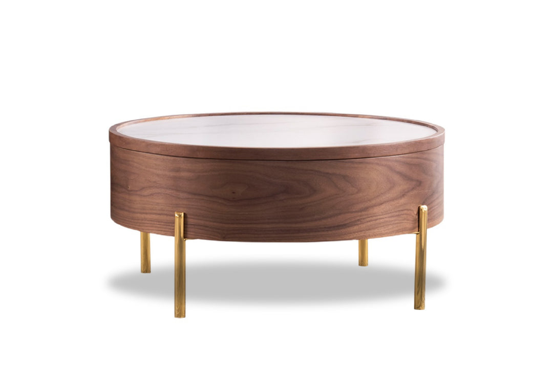 Round wooden coffee table with white top and gold legs on a white background