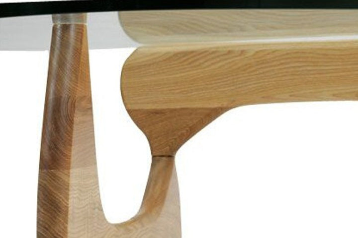 Close-up of wooden furniture legs on a white background