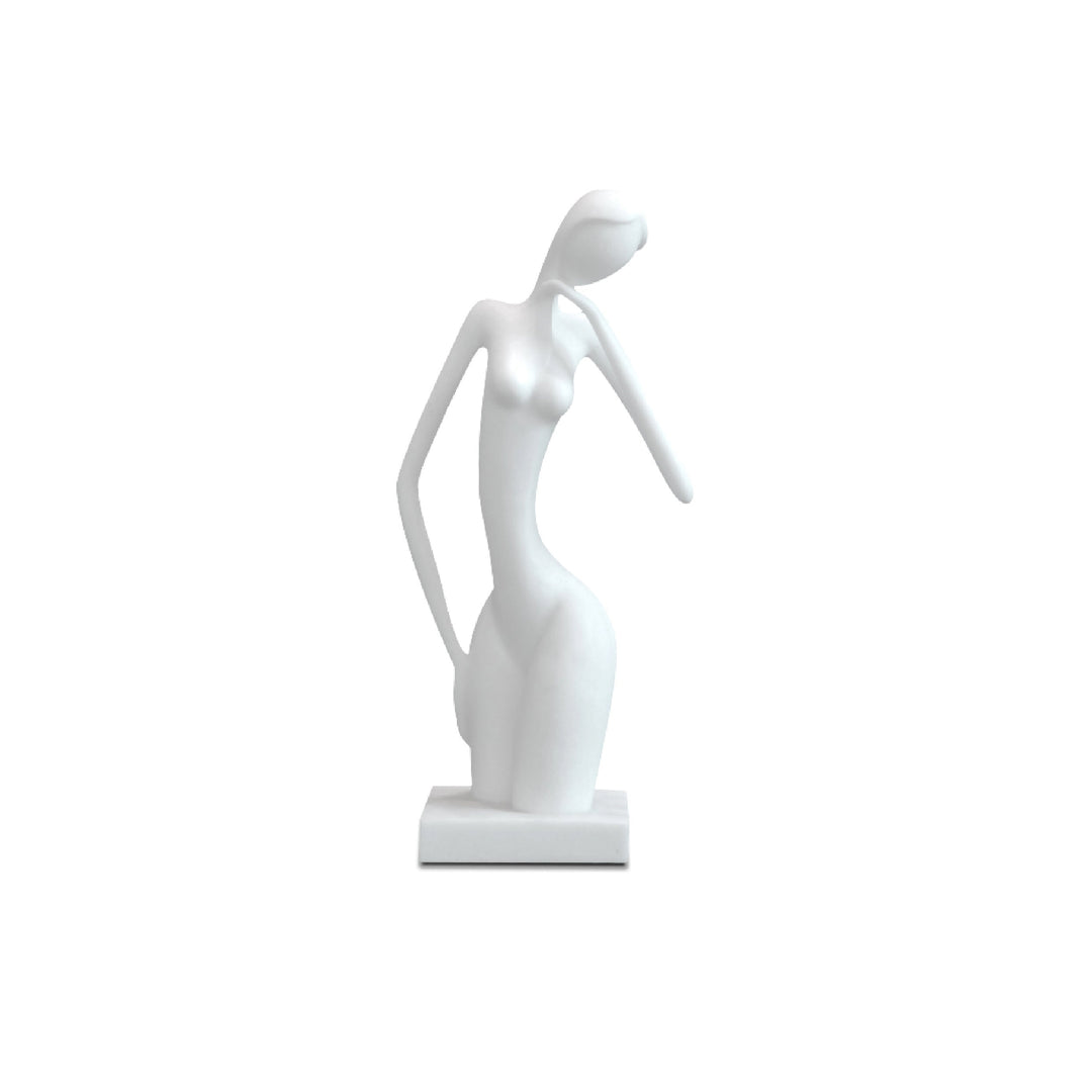 A white sandstone sculpture of a posing lady, with an abstract female form and flowing curves.