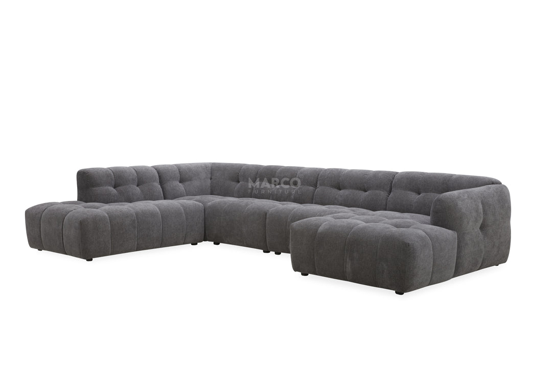 Gray sectional sofa with 'MARCO' branding on a white background