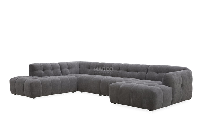 Gray sectional sofa with 'MARCO' branding on a white background